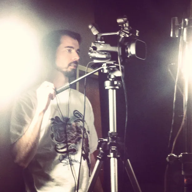 a shot of Craig operating a camera in a video studio