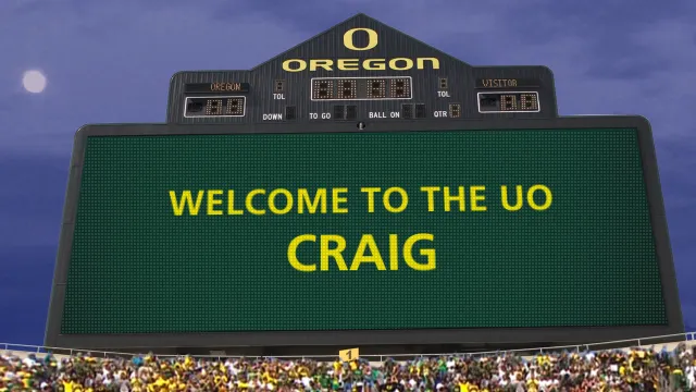 a personalized frame of video showing the scoreboard in the University of Oregon stadium that reads: Welcome to the UO, Craig